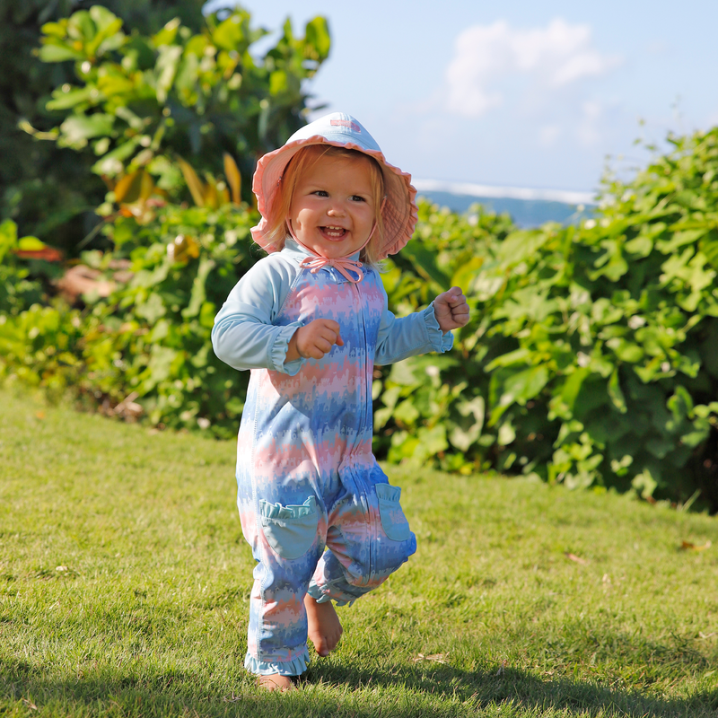 baby girl running in sun & swim suit in sandcastle dreams|lemonade-stand