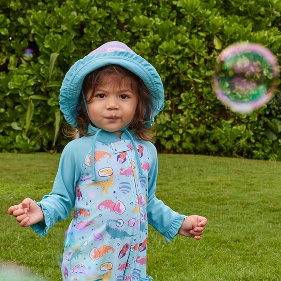 baby girl in reversible sun hat|daybreak-lakeshore