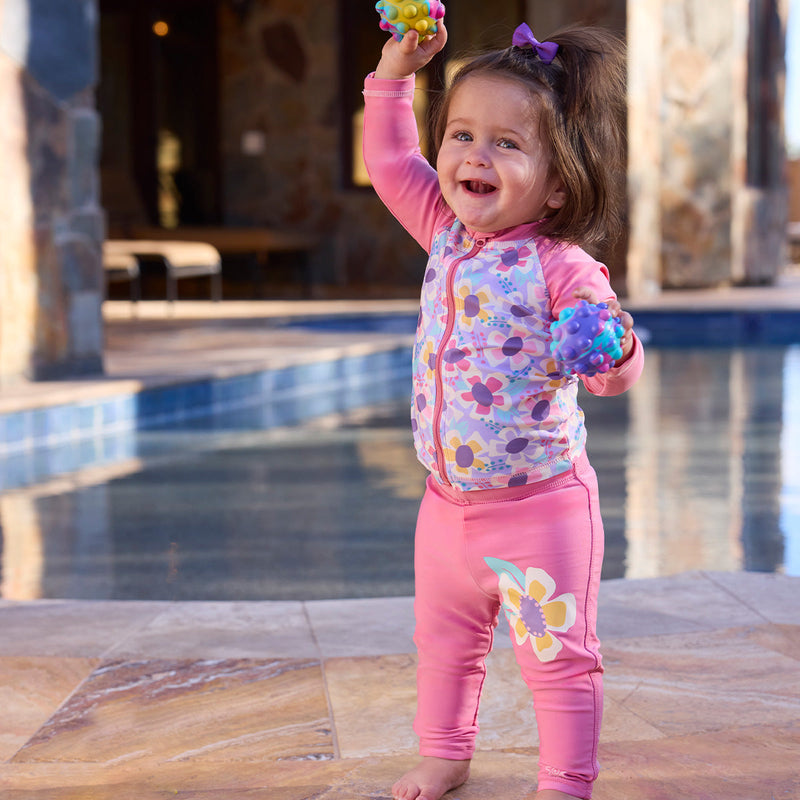 baby girl by pool in full zip rashguard|vintage-bloom