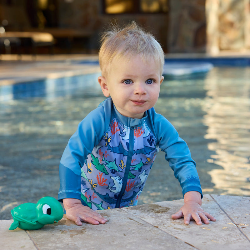 baby boy in pool in full zip rashguards|reef-sharks