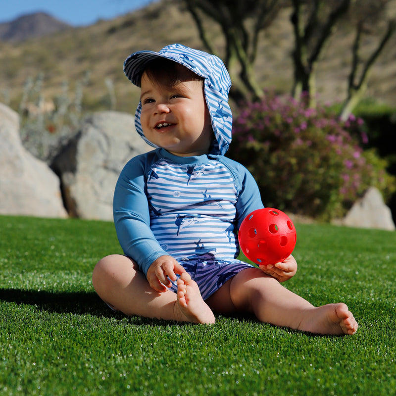 baby in long sleeve zippy sun and swim shirt|shark-stripe