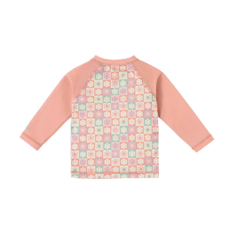 back view of baby zippy long sleeve swim shirt in tiled flowers|tiled-flowers