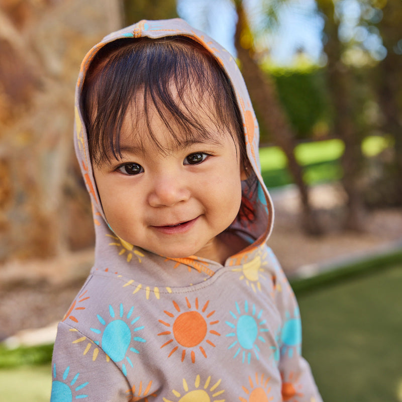 baby girl in hooded sunzie