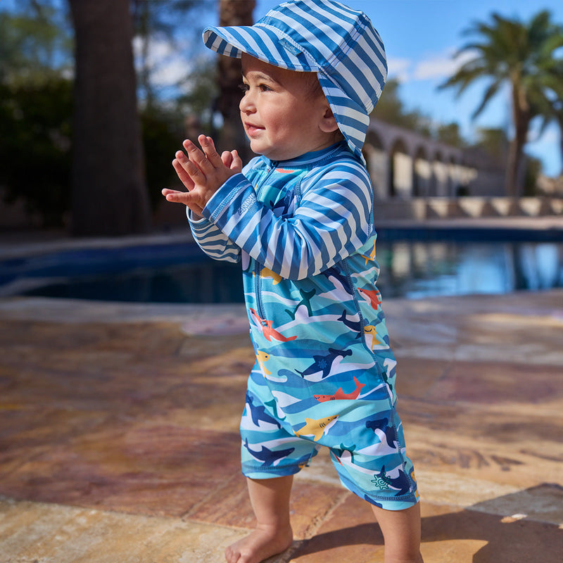 baby boy clapping in long sleeve swim romper|waverider-sharks