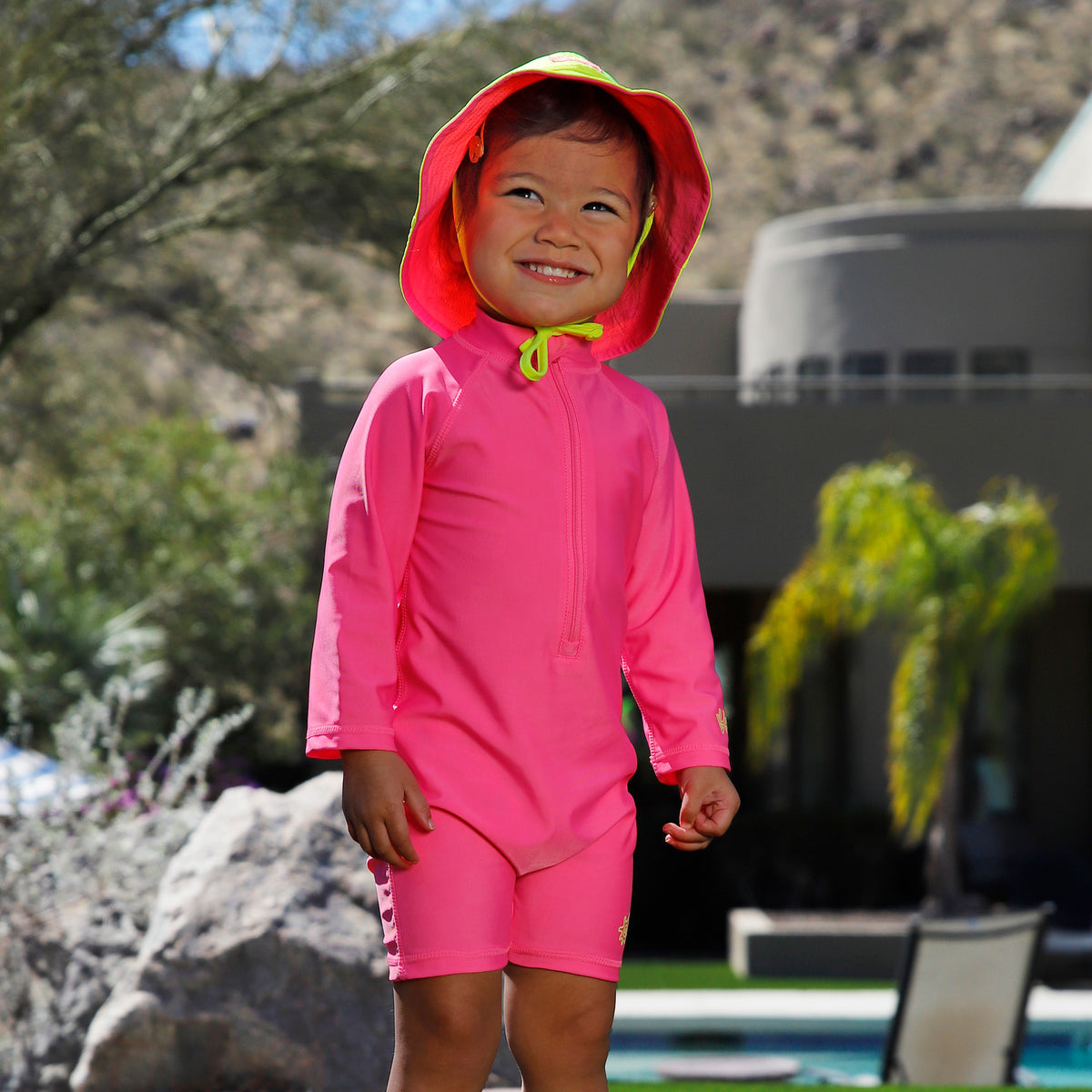 baby in neon magic long sleeve swim romper|neon-checkers