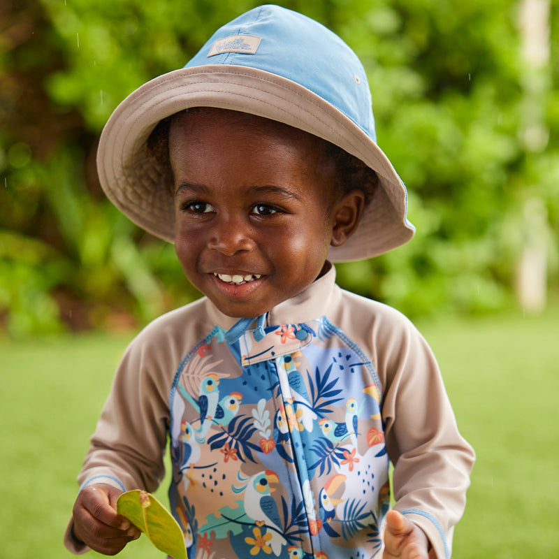 baby boy in reversible sun hat|baltic-sandstone