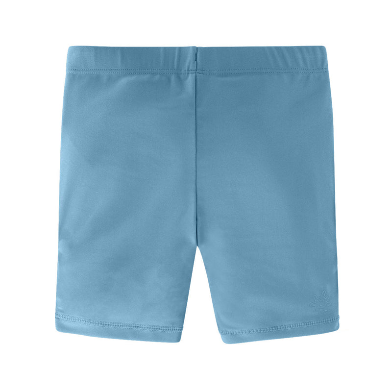 Back of girl's swim shorts in lagoon|lagoon