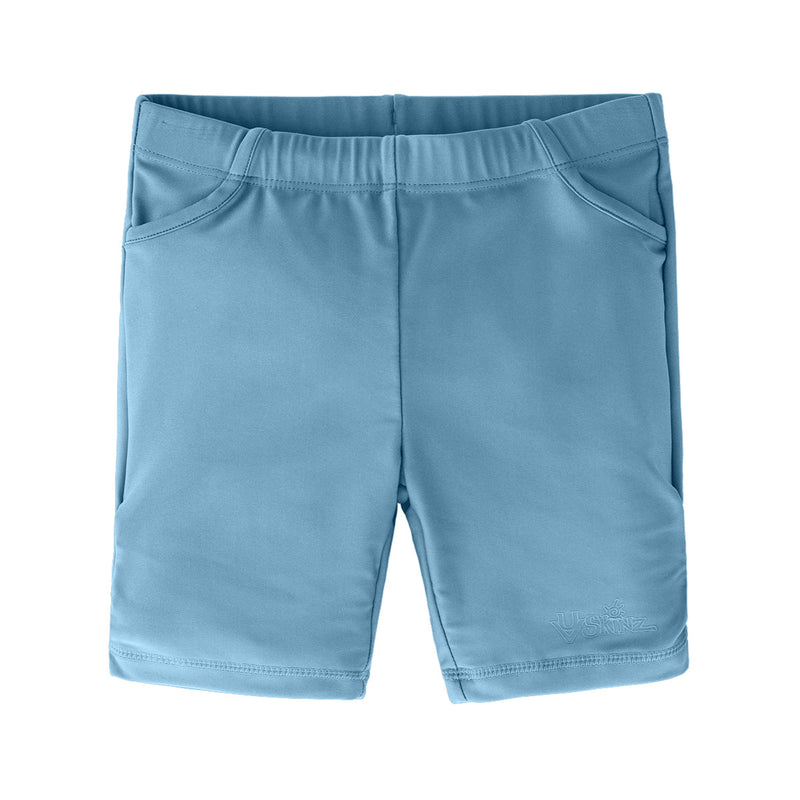 Girl's swim shorts in lagoon|lagoon