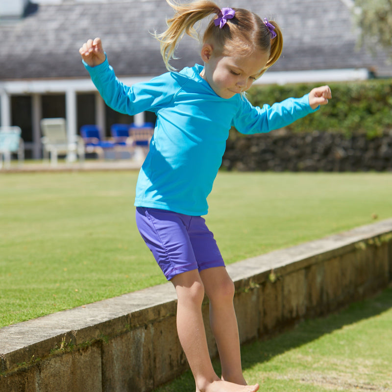 Little girl in the kid's long sleeve swim shirt in aqua|aqua