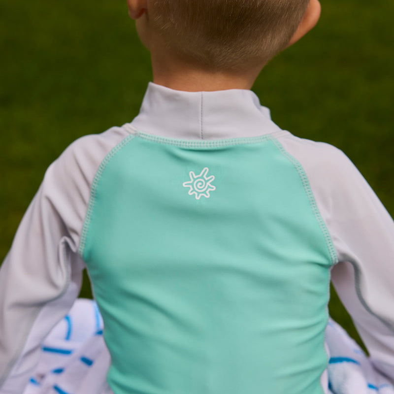 back close up of collar of boy in long sleeve sun swim shirt|vintage-sea-buddies