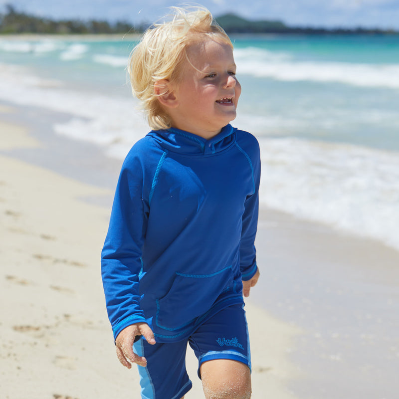 Little boy in UV Skinz's boy's pullover hoodie in navy|navy