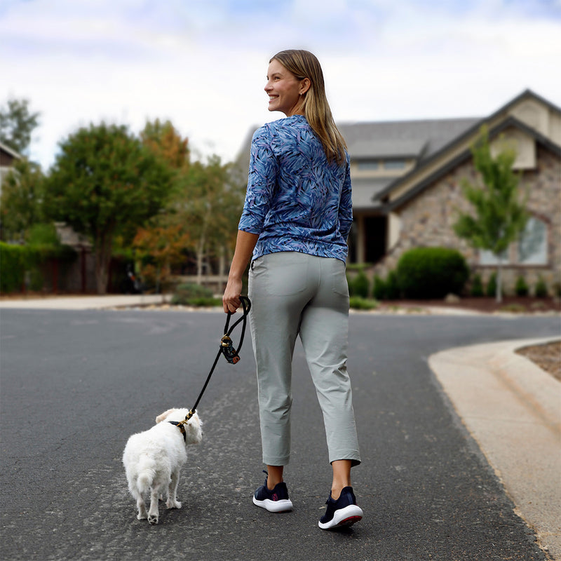 woman walking dog in walking capris in agave|agave