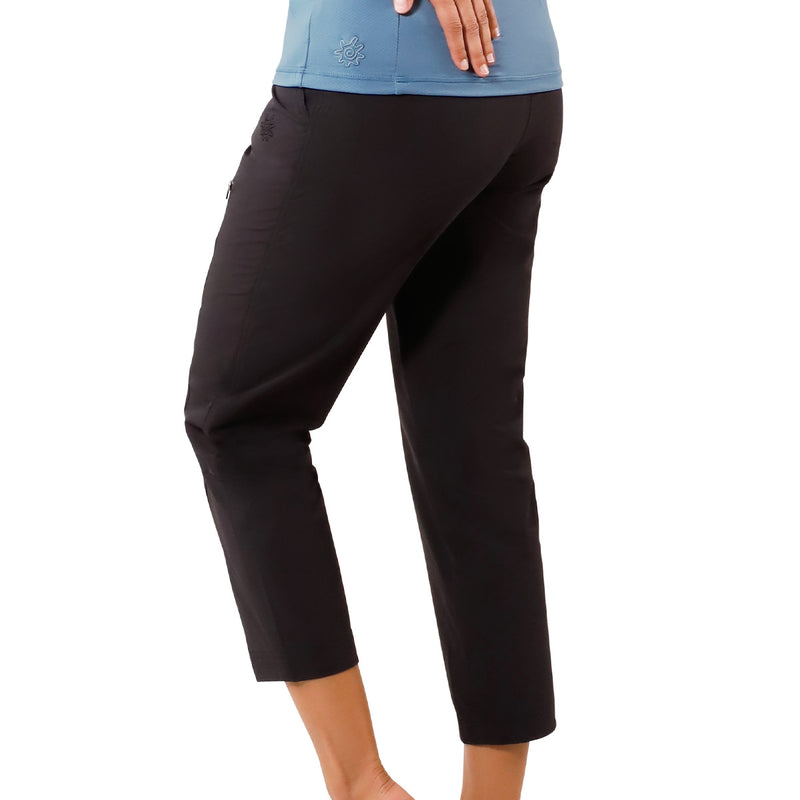 side view of woman in walking capris in black|black