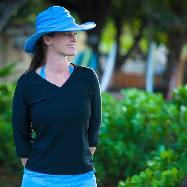 Woman wearing a sun protective swim hat|black