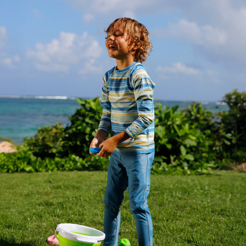 boy playing in kid's long sleeve crew sunny swim shirt in pinecrest stripe|pinecrest-stripe